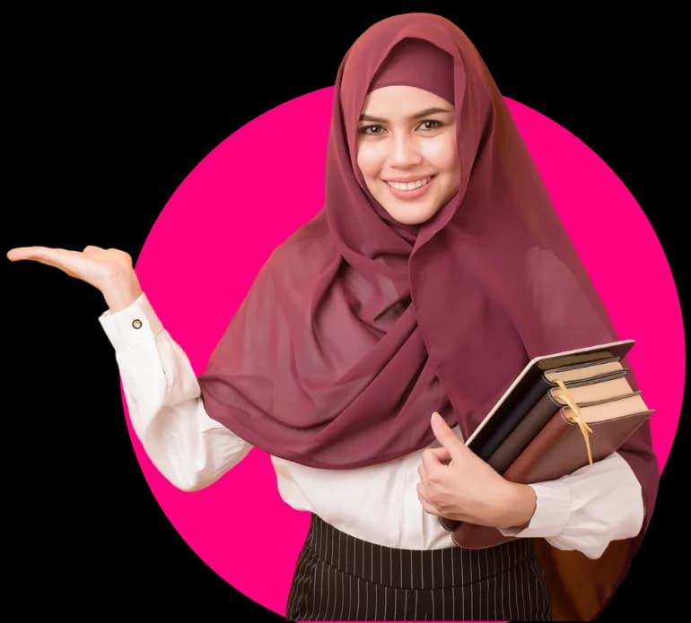 A smiling student holding a stack of books